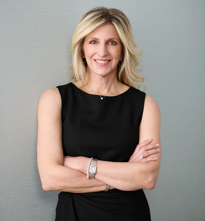 Dr. Rostan in a black dress