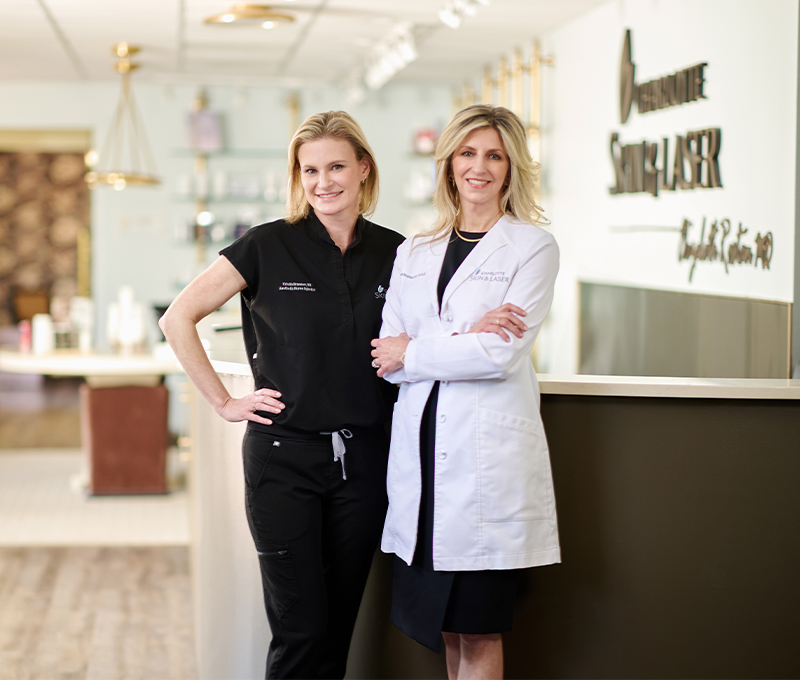 Dr Rostan in lobby of Charlotte Skin & Laser