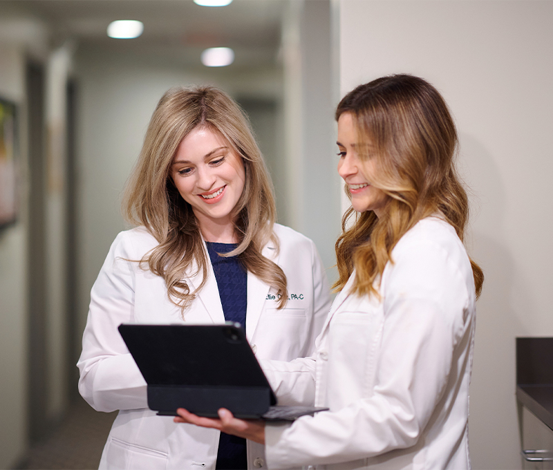 Dr. McLean reviewing patient info